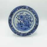 Chinese plate with blue and white decor depicting a landscape with some objects. Unmarked (export porcelain). Rimfritting., 23 cm, unknown